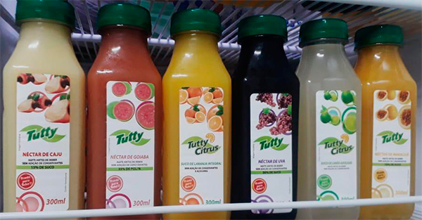 A Tutty Citrus produz sucos naturais de diversos sabores, experimente!
